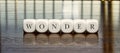 Word Wonder on beautiful background Royalty Free Stock Photo