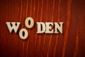 Word `Wooden` by wood letters