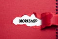 The word workshop appearing behind torn paper Royalty Free Stock Photo