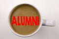 Word, writing Alumni Former Students text in coffee in cup. Business concept for Celebration Education Ending on white background