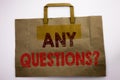 Word, writing Any Questions. Business concept for Answer Help Question Written on shopping bag, white background.