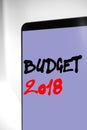 Word, writing Budget 2018. Business concept for Budget 2018 written on sticky note paper on the wooden background. Royalty Free Stock Photo