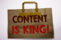 Word, writing Content Is King. Business concept for Online Internet Data Written on shopping bag, white isolated background.