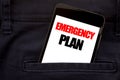 Word, writing Emergency Plan. Business concept for Disaster Protection Written phone mobile phone, cellphone placed in the man fro Royalty Free Stock Photo