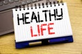 Word, writing Healthy Life. Business concept for Good Health Food written on notebook book on the wooden background in the Office Royalty Free Stock Photo