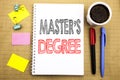 Word, writing Master s Degree. Business concept for Academic Education Written on notepad note paper background with space office Royalty Free Stock Photo