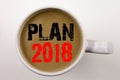 Word, writing Plan 2018 text in coffee in cup. Business concept for Strategy Action Plan 2018 on white background with copy space. Royalty Free Stock Photo