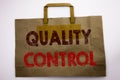 Word, writing Quality Control. Business concept for Improvement Work Written on shopping bag, white background.