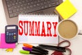 Word writing Summary in the office with laptop, marker, pen, stationery, coffee. Business concept for Brief Review Business Overvi