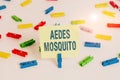 Word writing text Aedes Mosquito. Business concept for the yellow fever mosquito that can spread dengue fever Colored clothespin Royalty Free Stock Photo