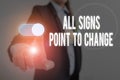 Word writing text All Signs Point To Change. Business concept for Necessity of doing things differently new vision Woman Royalty Free Stock Photo