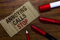Word writing text Annoying Calls Stop. Business concept for Prevent spam phones Blacklisting numbers Angry caller Pen pencil cap b