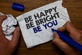 Word writing text Be Happy Be Bright Be You. Business concept for Self-confidence good attitude enjoy cheerful Hand hold paper lob