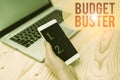 Word writing text Budget Buster. Business concept for Carefree Spending Bargains Unnecessary Purchases Overspending