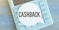 CASH BACK on white sticker on calculator, wooden Royalty Free Stock Photo