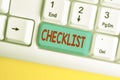 Word writing text Checklist. Business concept for List down of the detailed activity as guide of doing something White