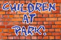 Word writing text Children At Park. Business concept for place specifically designed to enable children play there Brick Royalty Free Stock Photo