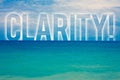 Word writing text Clarity. Business concept for Certainty Precision Purity Comprehensibility Transparency Accuracy Blue beach wate Royalty Free Stock Photo