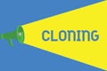 Word writing text Cloning. Business concept for Make identical copies of someone or something Creating clones