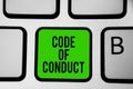 Word writing text Code Of Conduct. Business concept for Ethics rules moral codes ethical principles values respect Keyboard green Royalty Free Stock Photo