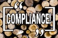 Word writing text Compliance. Business concept for Technology Company sets its policy standard regulations Wooden background Royalty Free Stock Photo