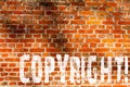 Word writing text Copyright. Business concept for Saying no to intellectual property piracy Brick Wall art like Graffiti