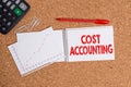 Word writing text Cost Accounting. Business concept for the recording of all the costs incurred in a business Desk notebook paper Royalty Free Stock Photo