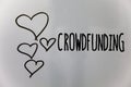 Word writing text Crowdfunding. Business concept for Funding a project by raising money from large number of people Hearts white b