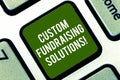 Word writing text Custom Fundraising Solutions. Business concept for software to help raising money online Keyboard key