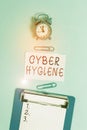 Word writing text Cyber Hygiene. Business concept for steps that computer users take to improve their cyber security Alarm clock