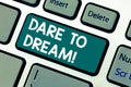 Word writing text Dare To Dream. Business concept for Do not be afraid of have great ambitions goals objectives Keyboard