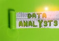 Word writing text Data Analysts. Business concept for Programmer Design and Create Report Identifies patterns. Royalty Free Stock Photo