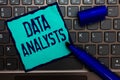 Word writing text Data Analysts. Business concept for Programmer Design and Create Report Identifies patterns Turquoise paper keyb Royalty Free Stock Photo
