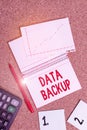 Word writing text Data Backup. Business concept for copy of important data that is stored on an alternative location Desk notebook Royalty Free Stock Photo