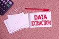 Word writing text Data Extraction. Business concept for act or process of retrieving data out of data sources Desk notebook paper Royalty Free Stock Photo