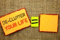 Word, writing, text De-Clutter Your Life. Conceptual photo Free Less Chaos Fresh Clean Routine written on Sticky note Paper Equat Royalty Free Stock Photo