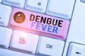 Word writing text Dengue Fever. Business concept for infectious disease caused by a flavivirus or aedes mosquitoes White