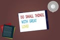 Word writing text Do Small Things With Great Love. Business concept for Motivation Inspire to make little actions Tablet