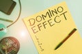 Word writing text Domino Effect. Business concept for Chain reaction that causing other similar events to happen Cardboard and Royalty Free Stock Photo