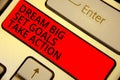 Word writing text Dream Big Set Goals Take Action. Business concept for Motivation to follow your dreams Inspiration Keyboard red Royalty Free Stock Photo