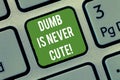 Word writing text Dumb Is Never Cute. Business concept for To be stupid ignorant is never an attractive feature Keyboard