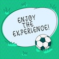 Word writing text Enjoy The Experience. Business concept for Taking pleasure in the situation that you are in Soccer Ball on the Royalty Free Stock Photo