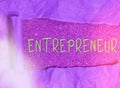 Word writing text Entrepreneur. Business concept for one who organizes and assumes the risks of a business Rolled ripped