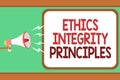 Word writing text Ethics Integrity Principles. Business concept for quality of being honest and having strong moral Man holding me