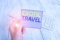 Word writing text Exotic Travel. Business concept for Travelling to unusual places or unfamiliar destination man holding colorful