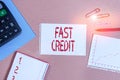 Word writing text Fast Credit. Business concept for Apply for a fast demonstratingal loan that lets you skip the hassles Striped