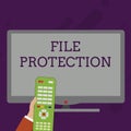 Word writing text File Protection. Business concept for Preventing accidental erasing of data using storage medium Hand Royalty Free Stock Photo