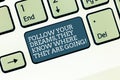 Word writing text Follow Your Dreams They Know Where They Are Going. Business concept for Accomplish goals Keyboard key