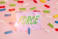 Word writing text Force. Business concept for strength or energy as an attribute of physical action or movement Colored clothespin