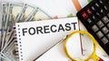 Word writing text FORECAST . Business concept with chart, dollars and office tools Royalty Free Stock Photo